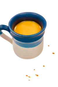 vibrant golden milk, blue jar, hug in a mug, delicious, creamy